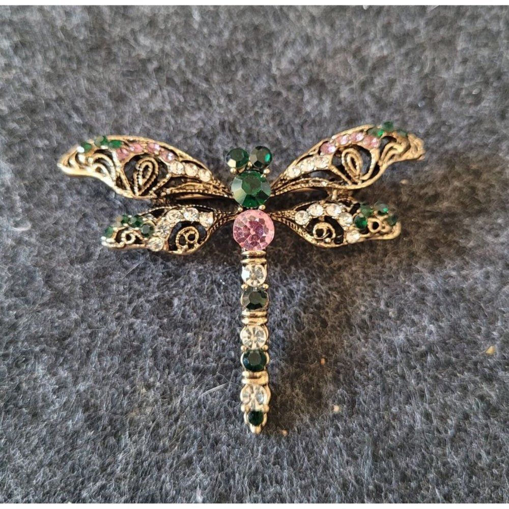 Art nouveau dragonfly brooch/Pendant with pink and green detail.